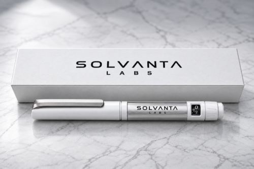 solvanta-labs-peptide-pen Silver and white Solvanta Labs research peptide pen with branded box